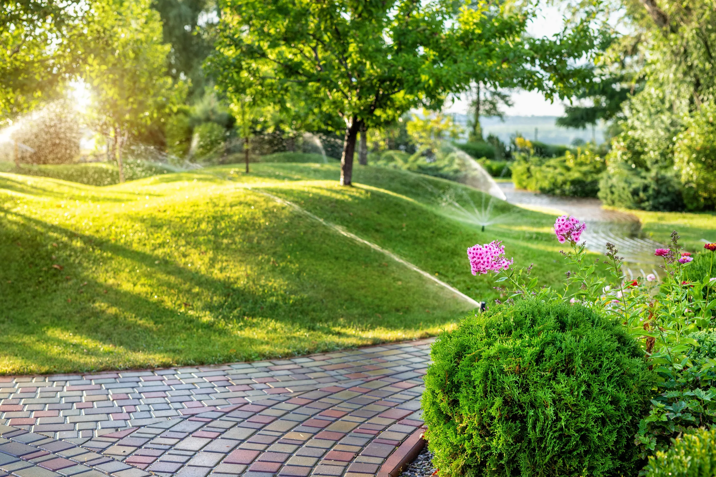 Spring irrigation turn-on—sprinkler system and healthy lawn