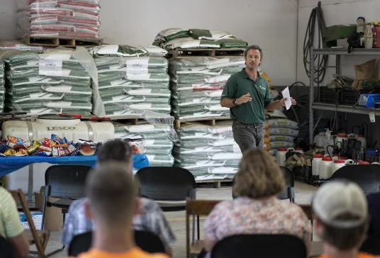 A family looking at flowers, landscaping company near me